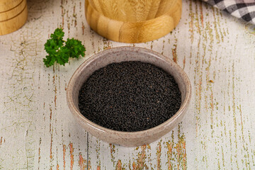 Black dry Nigella seeds in the bowl