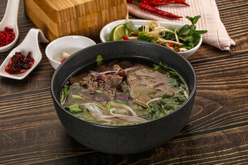 Vietnamese Pho Bo soup with beef and noodles
