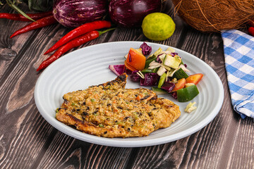 Tasty chicken steak with vegetables