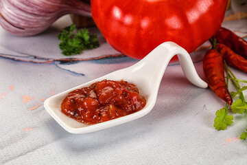 Salsa dip with chili and tomato