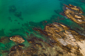 Top view seashore waves nature background,Amazing waves crashing on rocks seascape view