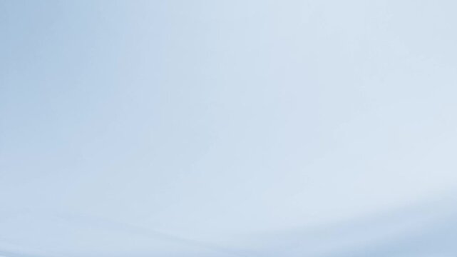 Light blue wave with grain flowing.  video animation. HD footage