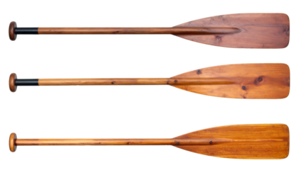 Wooden rowing oars resting against white backdrop, highlighting nautical equipment design