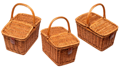 Three empty wicker picnic baskets with leather straps and hinged lids, isolated on transparent background