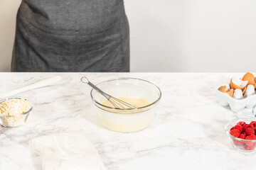 Whisking Delight - Bundt Cake Batter Preparation Begins