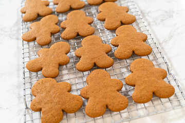 Preparing and Baking Classic Gingerbread Cookies in Gingerbread Man Shapes