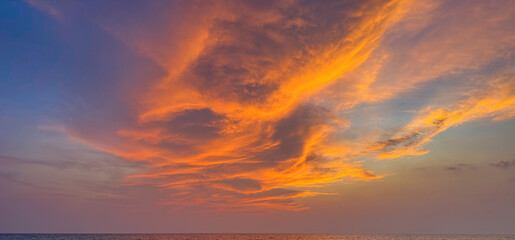 Dramatic and Vibrant Sunset clouds in goa