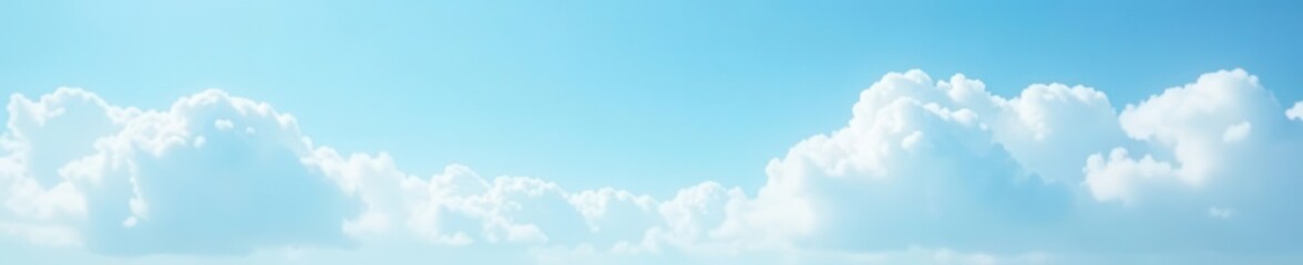 Obraz premium Soft blue sky gradient, fluffy white clouds, peaceful atmosphere, vast, cirrus