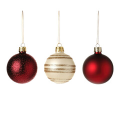 Three Festive Christmas Ornaments Hanging on Invisible Strings