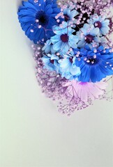 Bouquet with light lilac tones on a white background. Festive flower arrangement.  Background for greetings, postcards.