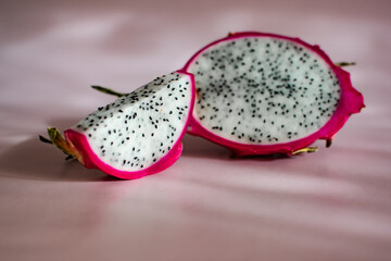 the concept of a healthy lifestyle. dragon fruit or pitahaya in the cut. a poster layout for...
