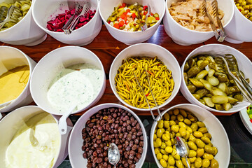 snacks olives cucumbers on buffet table