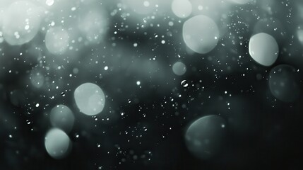 Abstract bokeh background of light.  Soft, diffused light creates a dreamy, elegant effect.  Delicate, shimmering particles in muted tones