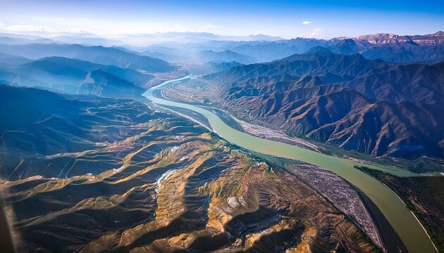 china view from airplane window on yongding river largest river to flow through beijing aerial view on mountainous terrain mountainous landscape wuding river or unfixed river because its flow was