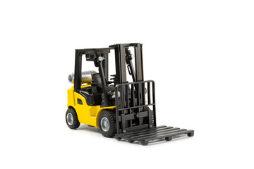 Yellow forklift isolated on white background. Logistics concept. Logistics and supply chain management for online shopping concept. Delivery of goods or products to the store worldwide. Cardboard box.