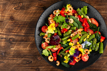 Shrimp Salad Bowl with Fresh Greens and Vegetables.