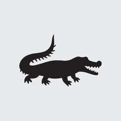Fototapeta premium Crocodile silhouette vector illustration. Black icon crocodile alligator on white background.