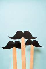 Mustaches on blue background. Prostate cancer awareness month and men health