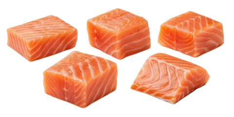 Fresh salmon cubes with vibrant orange color and smooth texture perfect for cooking or sushi preparation