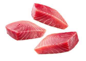 Fresh tuna pieces with vibrant red color and smooth texture perfect for cooking or sushi preparation in clean setting
