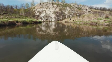 Embark on an unforgettable and immersive paddle journey as you glide gracefully along a serene river, enveloped by lush greenery and breathtaking natural landscapes all around you
