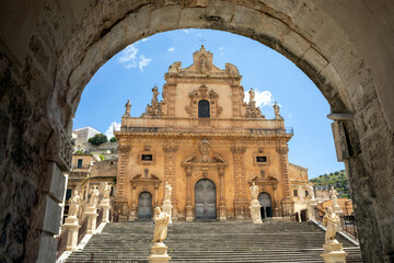 Facade of the Cathedral of St. Peter the Apostle in Modica, Sicily, Italy, with its typical...