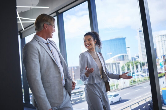 Collaboration, smile and tour with business people in airport together for international travel. Conversation, corporate or introduction with man and woman employee on bridge in terminal for flight