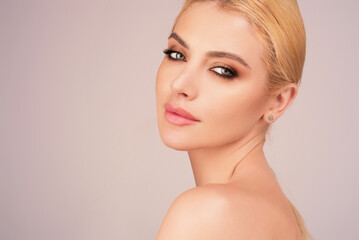 Fototapeta premium Beauty woman close-up portrait. Womans face. Beauty woman portrait. Sensual woman headshot. Pretty girl. Female fashion model closeup. Mascara visage for skin, lips, eyelashes. Perfect woman.