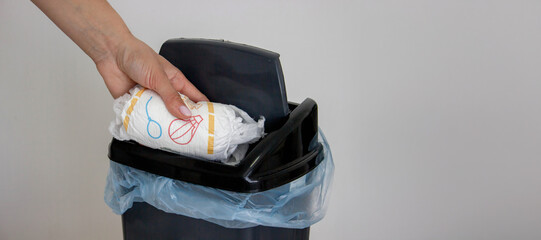Diaper waste, dirty diapers. Disposal of used baby diapers