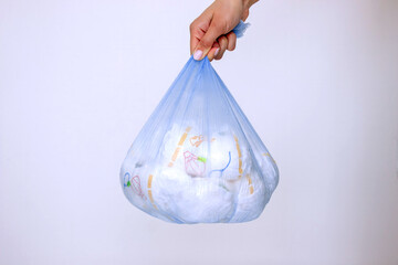 Diaper waste, dirty diapers. Disposal of used baby diapers