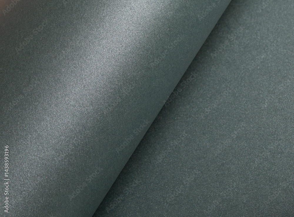 Aufkleber paper texture with metallic green tone, glossy rolled surface and shimmering gloss finish, elegant c