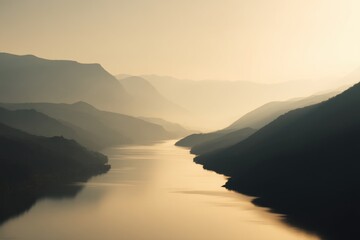 Fototapeta premium Calm river winding through lush valley distant mountains soft blur golden reflections