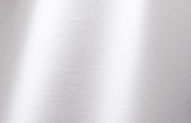Silver paper texture with pearlescent gloss, shimmering surface and metallic platinum tones, sleek wavy effect with a modern, minimalistic design, luxurious bright finish and elegant contrast for a.