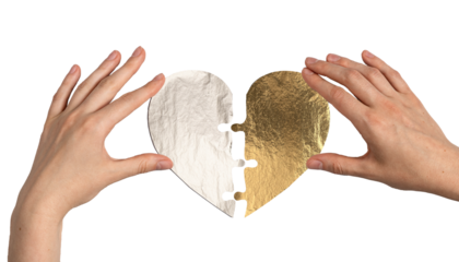 Two hands connecting a golden and silver heart puzzle, symbolizing love, emotional support, and partnership. Shiny metallic texture representing union and reconciliation, isolated on a white.