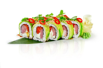Green dragon sushi rolls with salmon, avocado and red pepper flakes on white background