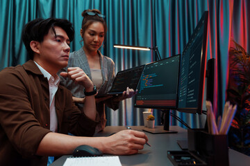 Serious of IT developers discussing intelligent website development coder system running data...