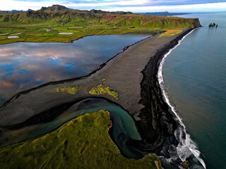 aerial view of the Vik's town black sand beach in Iceland