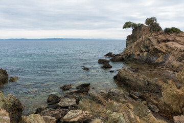 Beautiful scenery by the sea under a cloudy sky in Sithonia, Chalkidiki, Greece