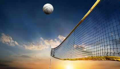 a volleyball is in the air and is about to hit the net the net is made of a mesh material