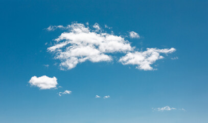 White Clouds on Clear Blue Sky – Natural Summer Background