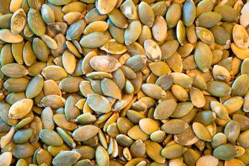 Detailed image from above of pumpkin seeds