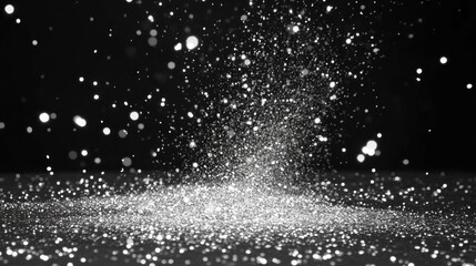 Sparkling glitter on black background; festive backdrop