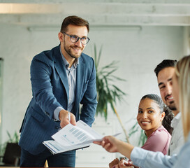 business; meeting; businessman;business meeting businessman office teamwork document contract agreement discussion working talking paperwork colleague man desk deal passing giving cheerful happy