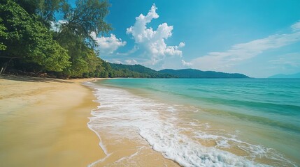 Obraz premium Stunning tropical beach scene with golden sand and turquoise water sea sun sky calm view ocean coast