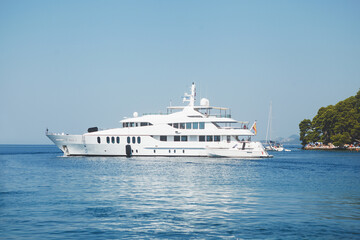 Enjoy a luxurious yacht sailing experience in the tranquil and serene waters of the ocean