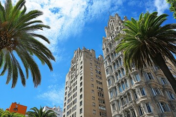 Majestic Architecture and Palm Trees Under a Blue Sky in a Sunny City