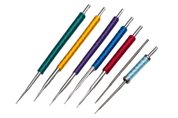 Thread rolls in various colors with needles.