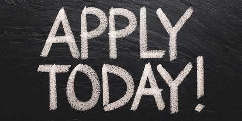 Chalk writing on dark slate, "Apply Today!" urging immediate action, showcasing a call to apply for something