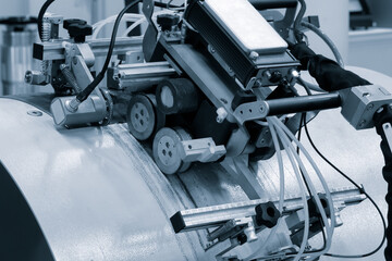 Ultrasonic and X-ray industrial equipment for testing the quality of a weld on a large diameter metal pipe, industrial concept