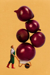 Smiling farmer woman carries stacked giant onions on wheelbarrow against orange background. Creative design. Concept of farming, harvest season, organic products, surrealism